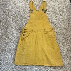 Yellow overall dress! Really cute layered and with boots, like new! Fits XS-M!